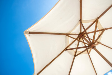 umbrella on blue sky background.