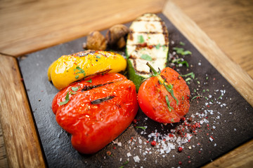 Grilled vegetables on a stone board