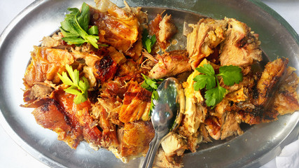 Pieces of meat in an iron plate