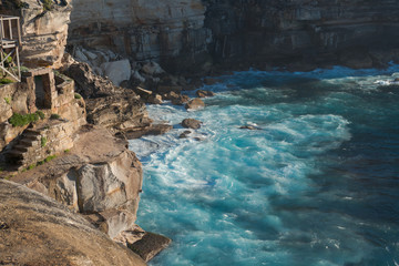 Rock cliff side at Diamond Bay, Sydney, Australia