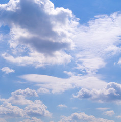 blue sky with white and gray clouds; cumulus. background; nature