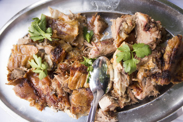Pieces of meat in an iron plate