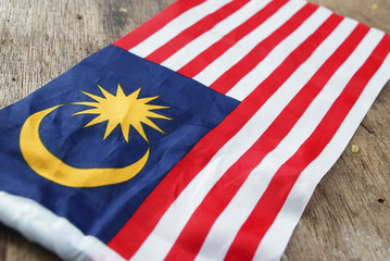 Independence Day concept - Malaysian Flag Over Wooden Background