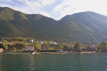 Fototapeta na wymiar Small town Prcan on the shore of the Kotor Bay