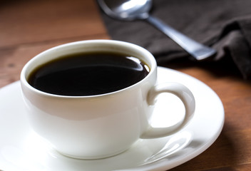 Coffee espresso black cup wooden background
