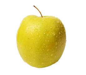 Yellow spelled appetizing apple dotted with drops of water on a white isolated background