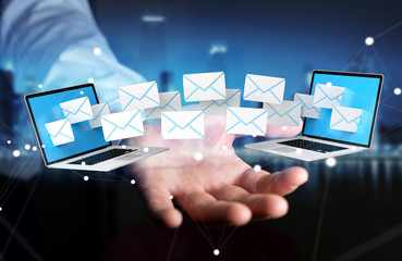 Businessman receiving e-mails on his digital devices 3D rendering