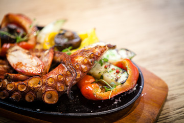 Boiled octopus with vegetables