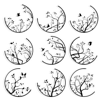 Abstract round icons framed tree branches and flock of birds.