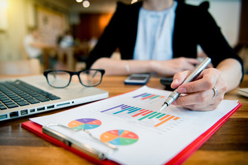 businesswoman hand working with finances
