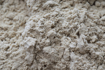 closeup of sand pattern of a beach in the summer