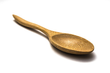 wooden spoon on white isolate.