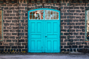 Entrance door to an old steel mill in Avesta Sweden, building made of cinder stones