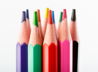 Fototapeta premium Color pencils isolated on white background. Many different colored pencils. Colored drawing pencils in a variety of colors