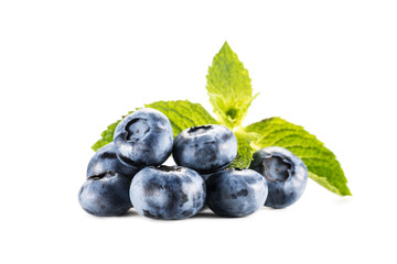 pile of blueberries with mint leaves