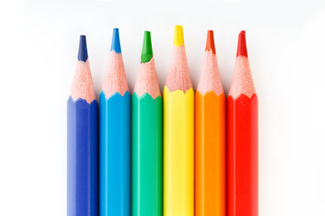 Fototapeta premium Color pencils isolated on white background. Many different colored pencils. Colored drawing pencils in a variety of colors