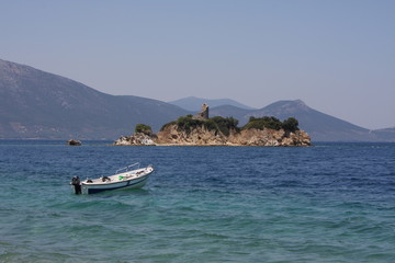 Fototapeta na wymiar boat n a beautiful bay, Evia, Greece
