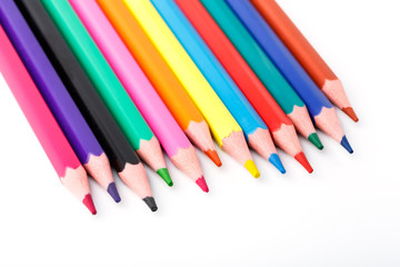 Color pencils isolated on white background. Many different colored pencils. Colored drawing pencils in a variety of colors