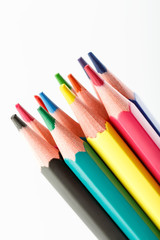 Color pencils isolated on white background. Many different colored pencils. Colored drawing pencils in a variety of colors
