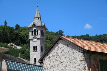 Fototapeta premium Church tower in Pella at Lake Orta in summer, Piedmont Italy 