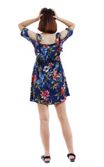 Back view of shocked woman in dress. upset young girl. Rear view people collection.  backside view of person.  Isolated over white background. The short-haired girl clutched her head.