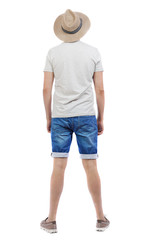 Back view of young man in shorts and hat. Rear view people collection.  backside view of person. ...