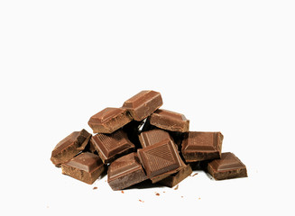 Pile of chocolate chunks Isolated on White Background, with free space for text and design 