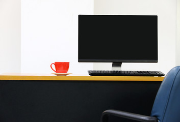 computer screen PC. for business on the table With cup of red coffee