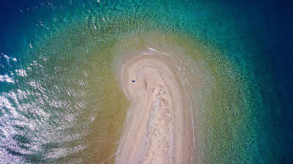 Aerial drone photo of seascape near Kavos beach with sapphire and turquoise clear waters, North Evoia gulf, Greece