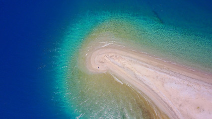 Aerial drone photo of seascape near Kavos beach with sapphire and turquoise clear waters, North Evoia gulf, Greece