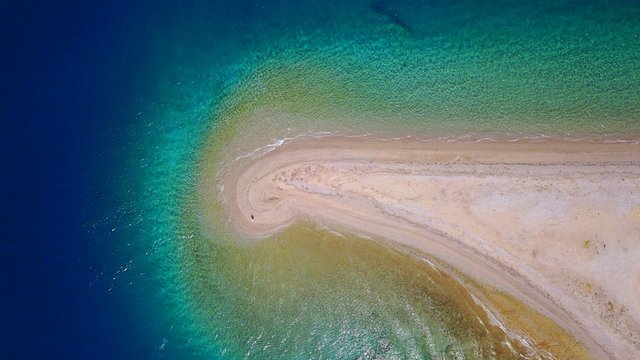 Aerial drone photo of seascape near Kavos beach with sapphire and turquoise clear waters, North Evoia gulf, Greece