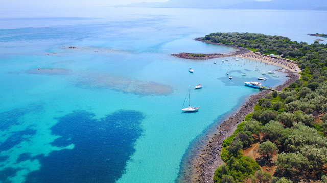 Aerial drone photo of exotic beaches with sapphire and turquoise clear waters, called the "Seychelles" of Greece, Lihadonisia island complex, North Evoia gulf, Greece