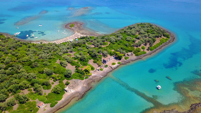 Aerial drone photo of exotic beaches with sapphire and turquoise clear waters, called the "Seychelles" of Greece, Lihadonisia island complex, North Evoia gulf, Greece