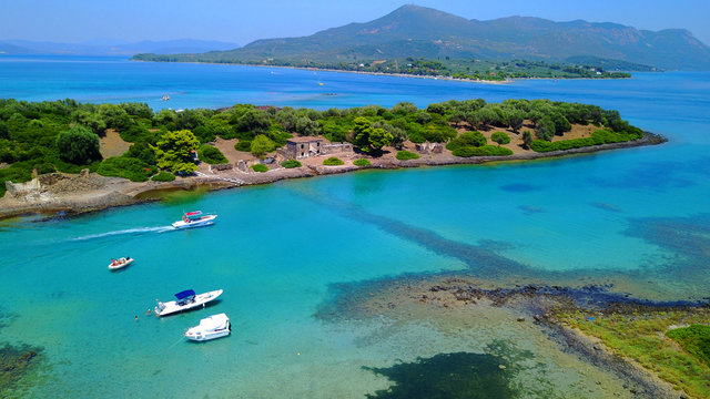 Aerial drone photo of exotic beaches with sapphire and turquoise clear waters, called the "Seychelles" of Greece, Lihadonisia island complex, North Evoia gulf, Greece