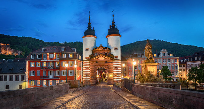 Illuminated Old Bridge Gate on Karl Theodor Bridge in Heidelberg, Baden-Wurttemberg, Germany