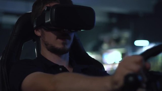 Man in VR Glasses. Virtual Reality Gaming.