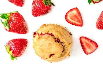Strawberry muffin closeup with fresh berries and copyspace