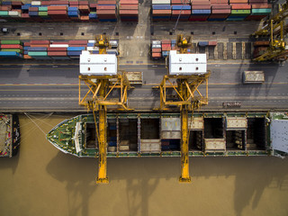 Aerial View Above the Bangkok Dockyard by the Chao Phraya River with Cargo Ships Waiting to be Upload and Offload Cargo Containers