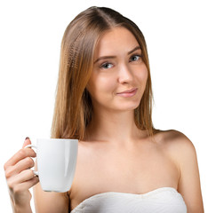 Obraz na płótnie Canvas Portrait of young beautiful woman drinking coffee or tea