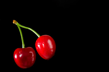 Cherries on a black background
