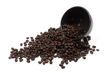 Roasted coffee beans in a cup of coffee