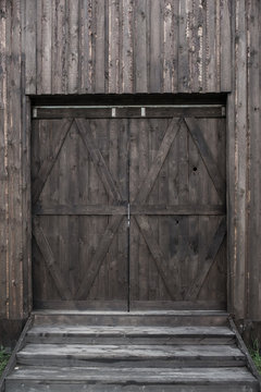 Countryside aged old farm barn gates closeup