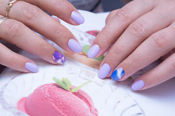 Obraz na płótnie Canvas Beautiful natural nails. Clean manicure and nail art. Women's hands