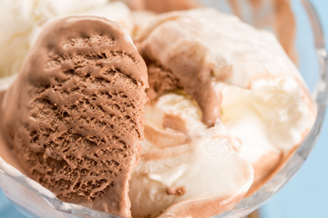 Closeup macro vanilla chocolate ice cream in the bowl
