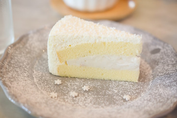 Coconut cream cake, selective focus