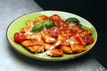 Ravioli with tomato sauce and basil