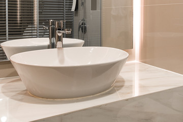 Bathroom interior with sink and faucet