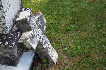 Stone cross in old cemetery 