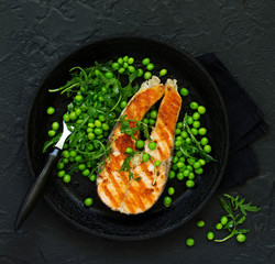 baked fish or roasted fillet or steak with peas,