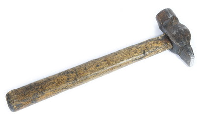 Old and dirty  hammer on a white background